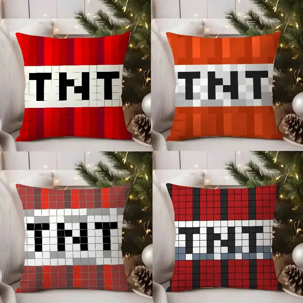 Four TNT block explosion pillow covers; red/orange double-sided plush fabric with bold block print