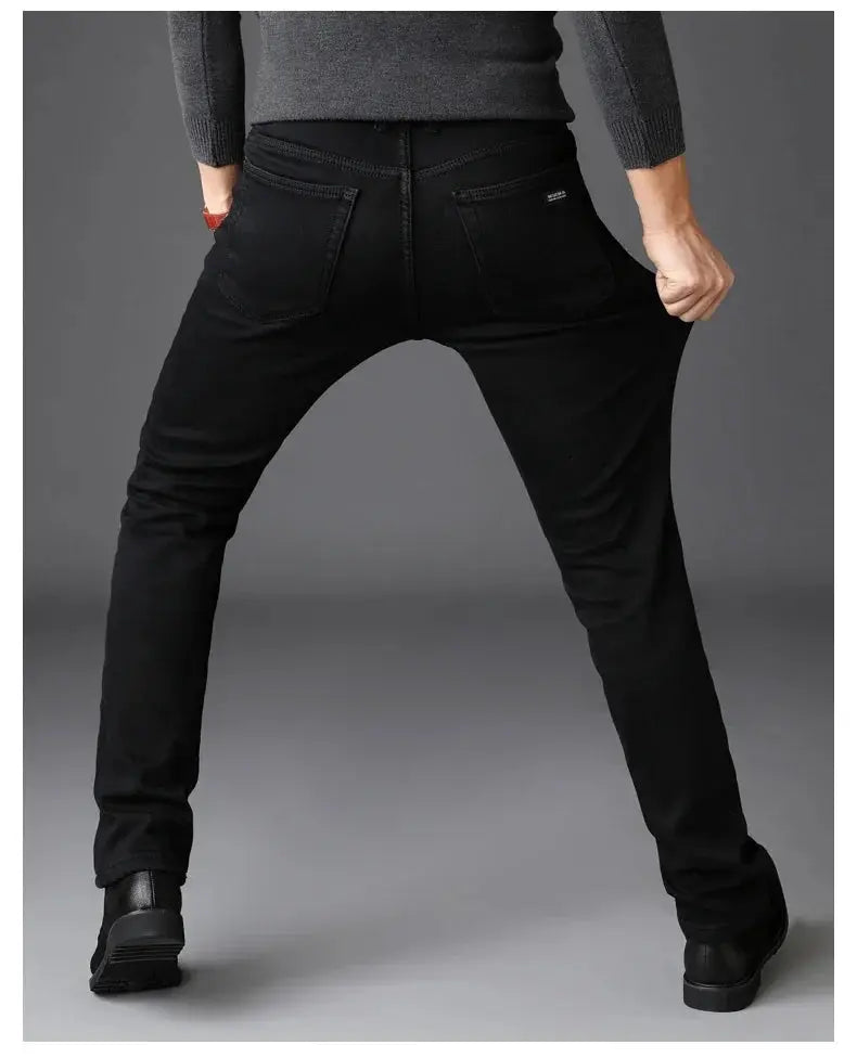 Men's black stretch denim jeans, back view with two rear pockets; slim fit, Simples Market
