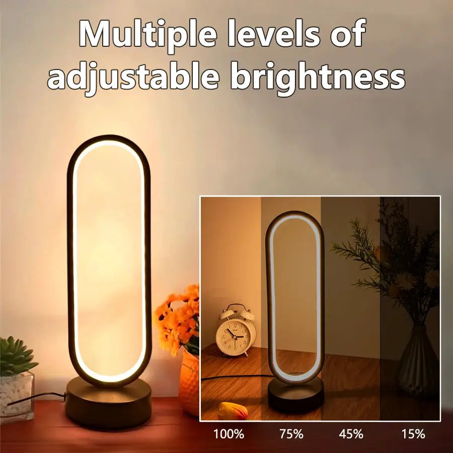 Bedroom oval ring LED night lamp with black frame and dimmable warm white light