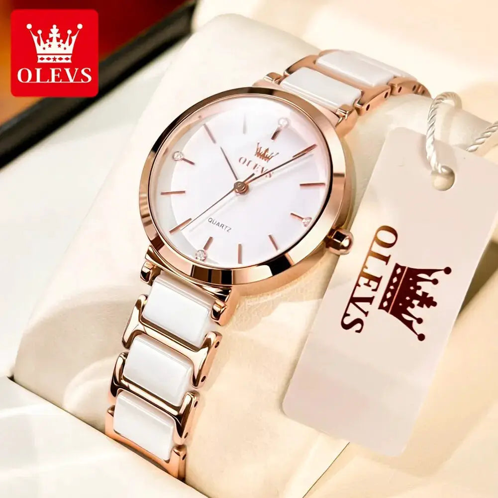 OLEVS women's quartz watch with rose-gold case and white ceramic link bracelet.