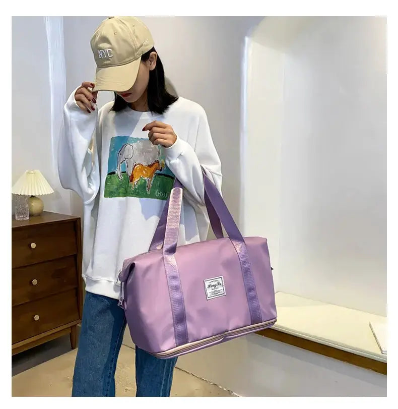 Carry-on duffle bag by Simples Market UNIXINU, lavender nylon with light purple straps and logo patch