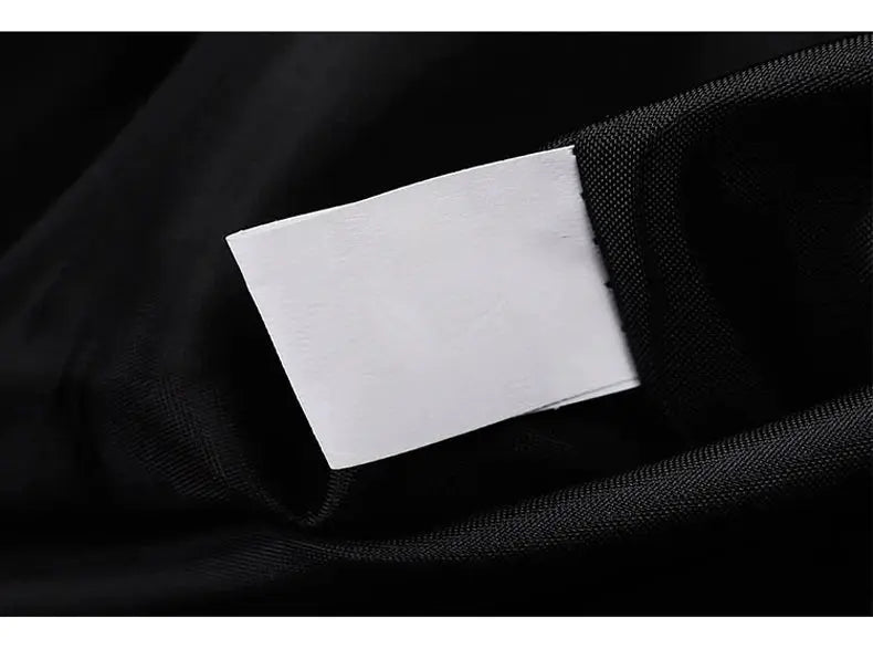 Hip Hop varsity jacket on black windbreaker fabric with a white inner tag