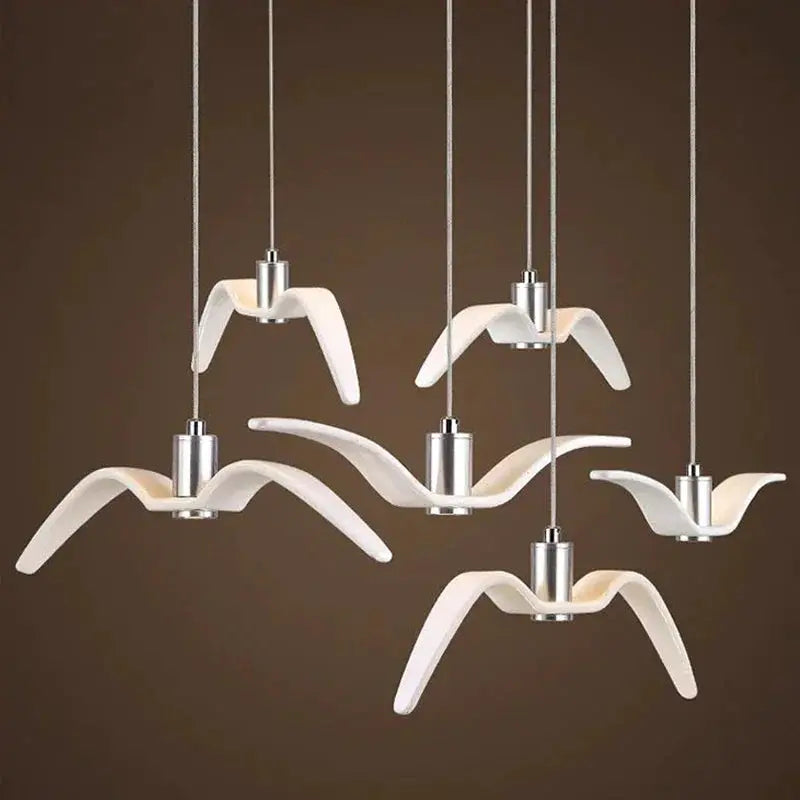 Simples Market seagull-design LED pendant lamps, six white bird-shaped chandeliers for bar or kitchen