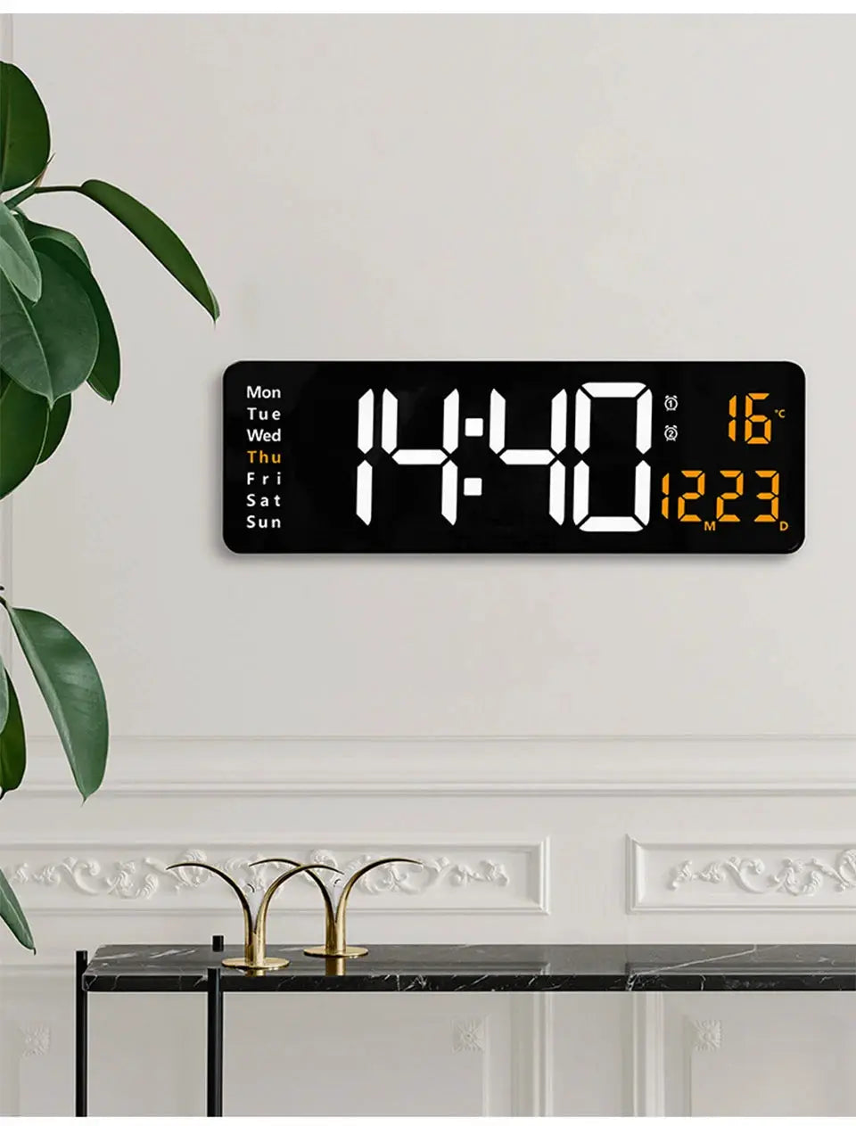 Large black digital wall clock with white LED time digits, weekday list on left and orange temperature/date readouts