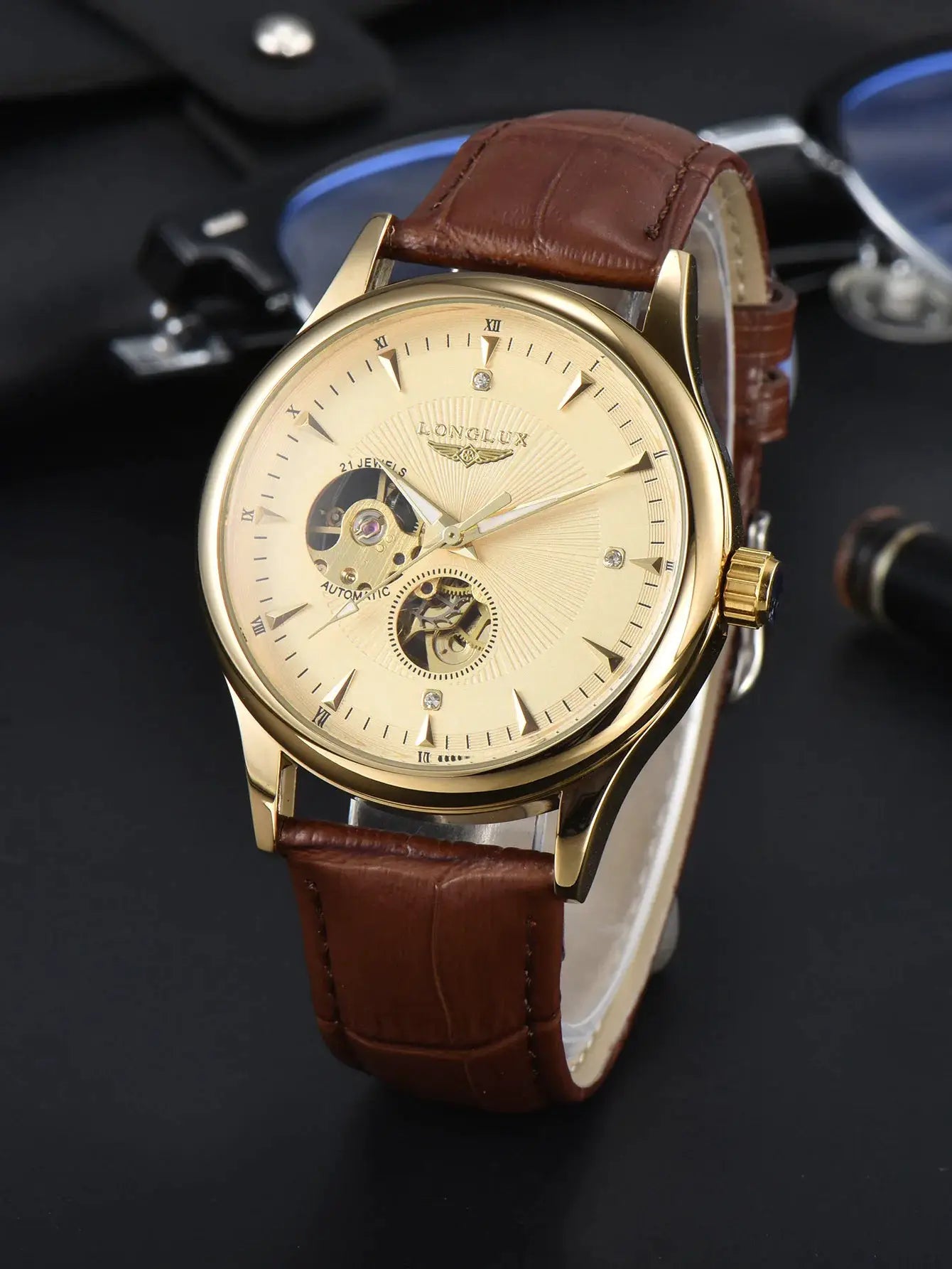 LONGLUX automatic skeleton wristwatch, gold-tone case with brown leather strap