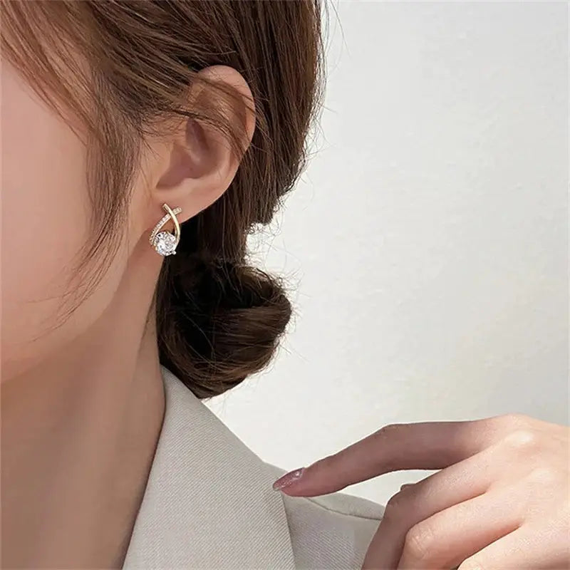 SKEDS cross stud earring, gold-tone with crystal drop for women