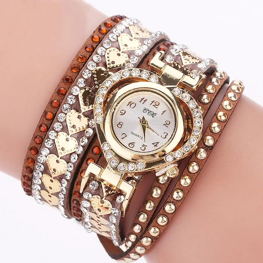Simples Market wrap watch with rhinestone heart bezel, gold-tone case, and brown velvet straps