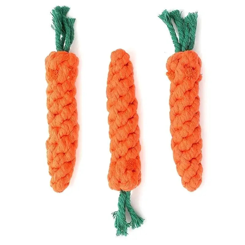 Carrot-shaped dog and cat knot toy, orange cotton rope chew with green frayed ends; 3 pieces shown.