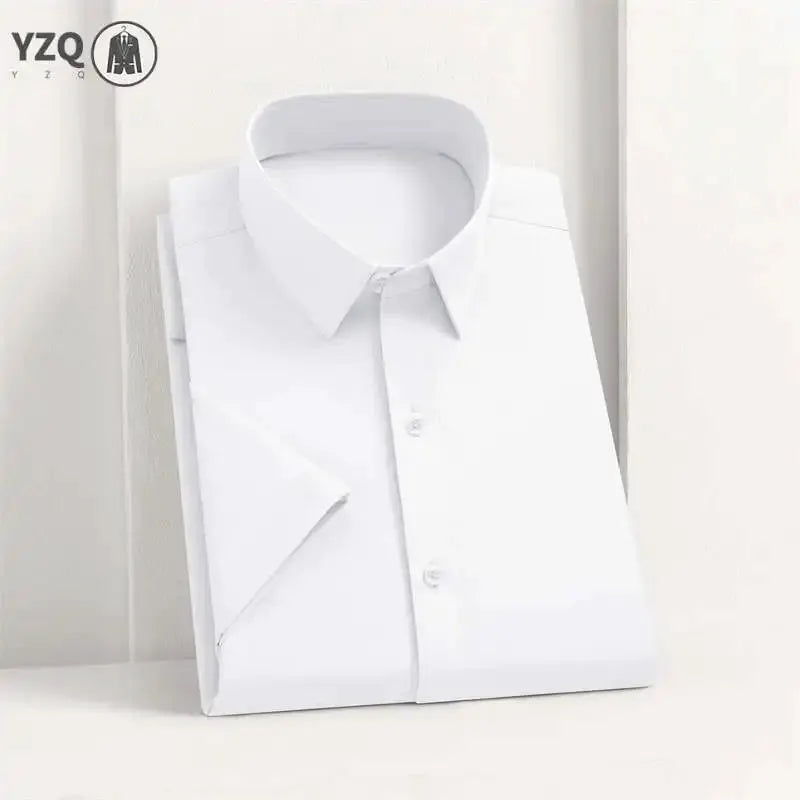 Men's white business casual shirt by Simples Market, solid color, with YZQ logo visible, neatly folded.