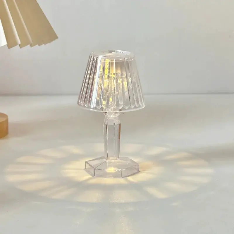 Mini crystal table lamp by Simples Market; clear faceted shade, battery-powered LED night light.