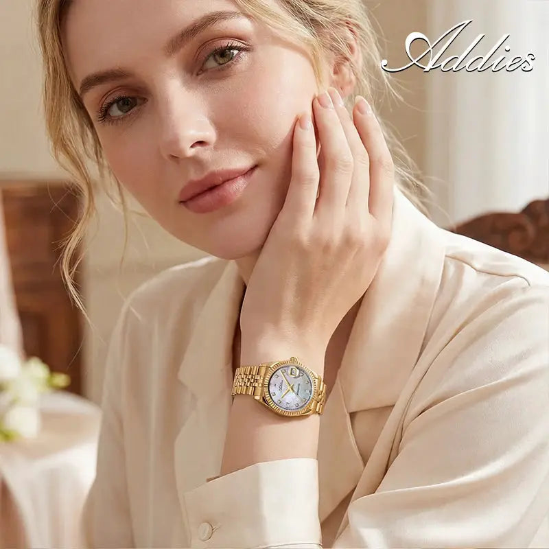 Addies New Luxury Women's Gold-Tone Stainless Steel Watch with sapphire glass on model's wrist