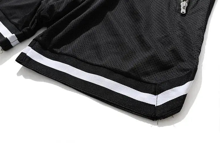Men's black mesh basketball shorts by Simples Market with white double-stripe hem and quick-dry fabric.