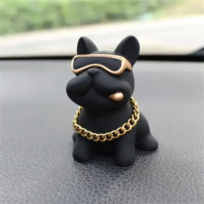 Bulldog car ornament in black resin with gold sunglasses and chain, dashboard decor by Simples Market.
