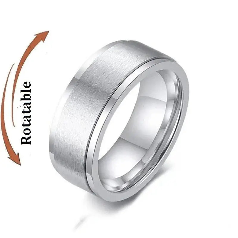 Stainless steel knuckle ring fidget spinner with rotating outer band, silver tone.