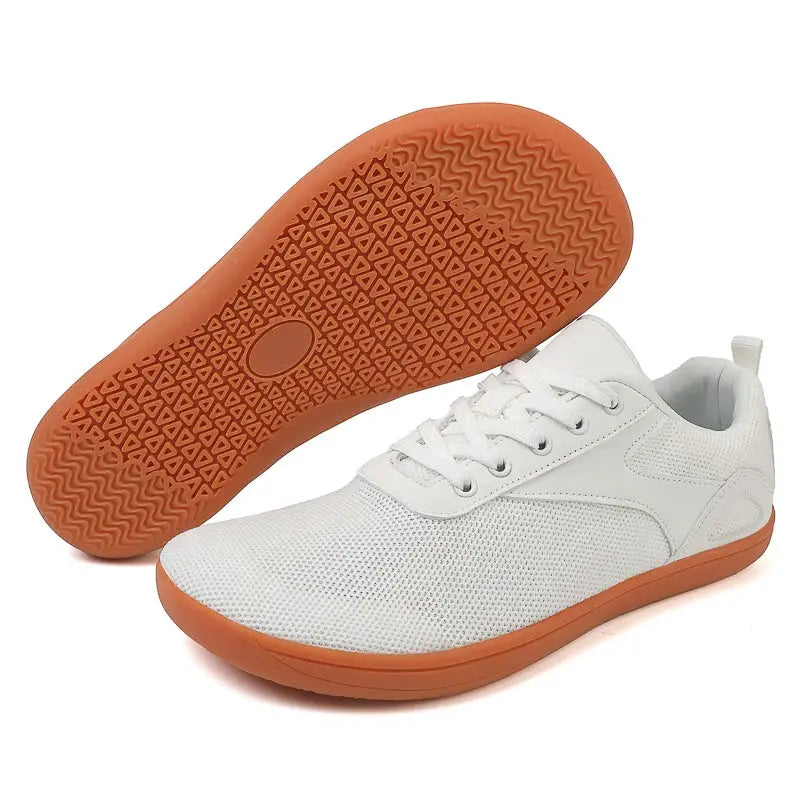 Wide-toed casual sneakers by Simples Market, white mesh upper with orange sole