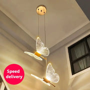 LED Modern Butterfly Pendant Light by Simples Market; two illuminated butterfly LED pendants for indoor spaces