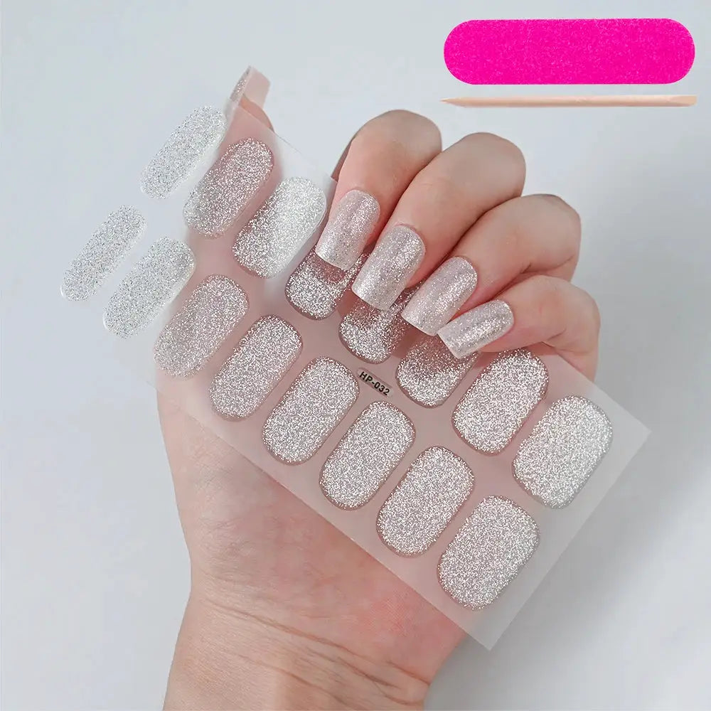 Nail sticker sheet with 16 silver glitter full-cover wraps for UV gel nails