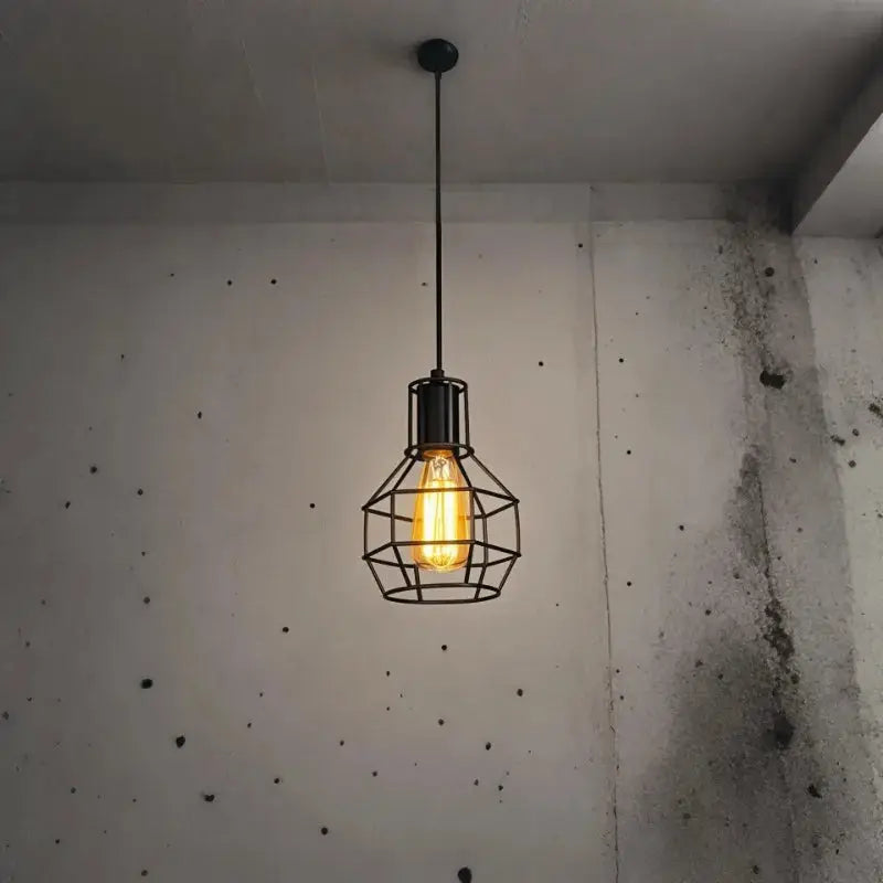 Industrial retro iron art pendant light with black metal cage frame and warm Edison bulb