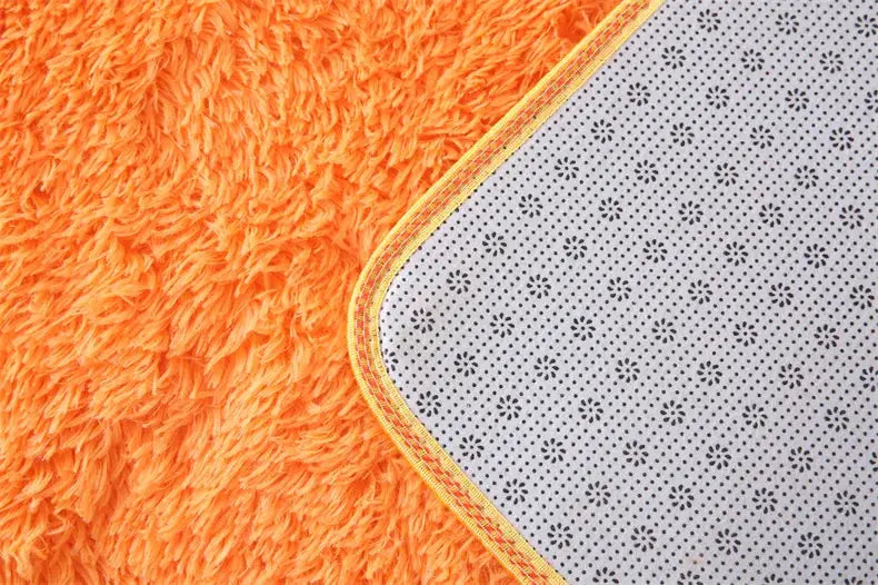 Simples Market Premium Fluffy Area Rug orange shag with grey dotted underside and yellow trim