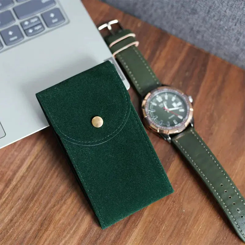 Embers watch bag in green flannelette with brass snap closure, portable travel storage case