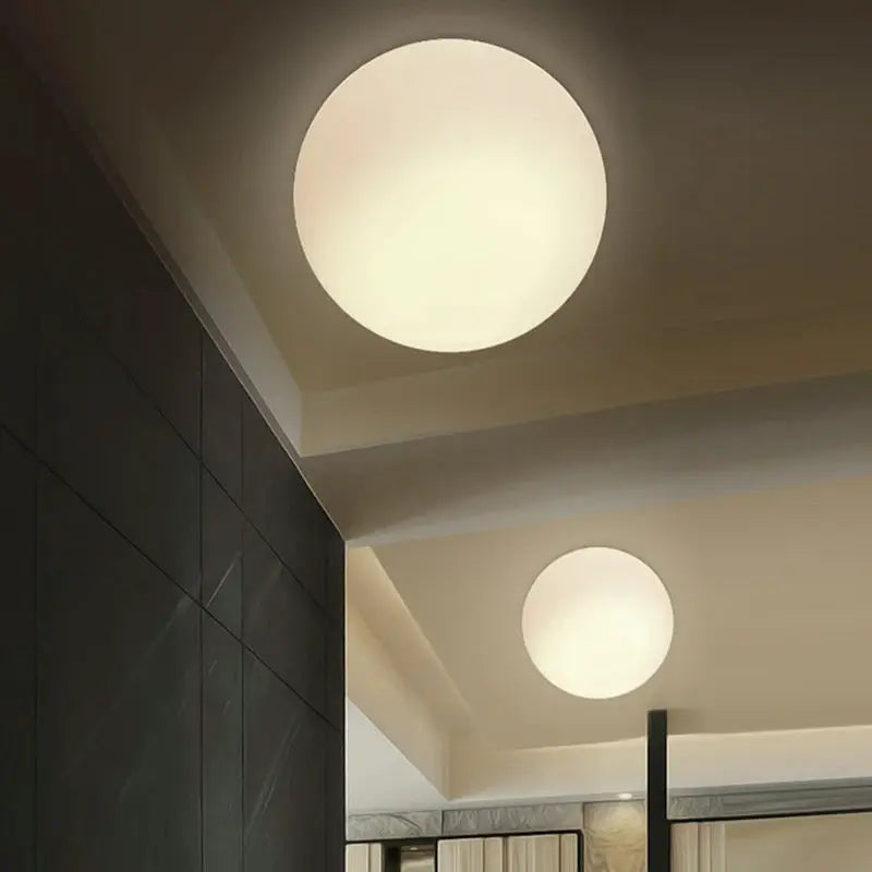 LED glass white ball ceiling light by Simples Market; minimalist round ceiling lamps (2) in a modern interior