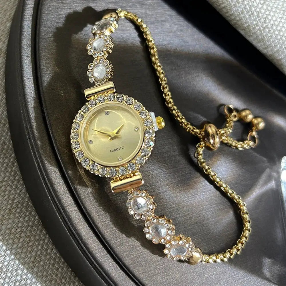 Gold-tone rhinestone women's bracelet watch with diamond-embellished bezel