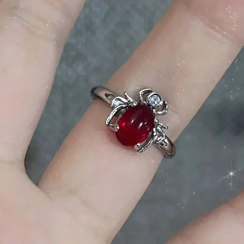 Goth punk open ring with red crystal heart on silver-tone band