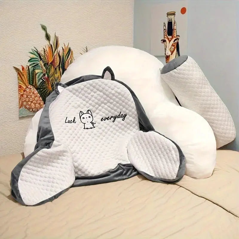 Adjustable reading pillow set: gray quilted back support with two arm cushions on a bed