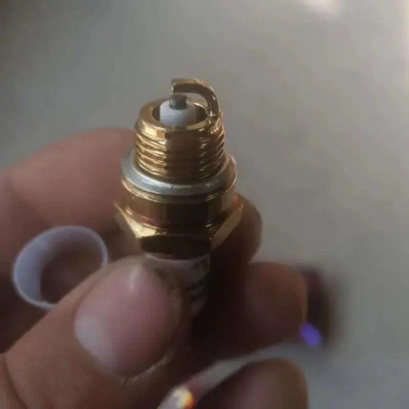BM6A spark plug for small engines; brass body with white insulator, Simples Market