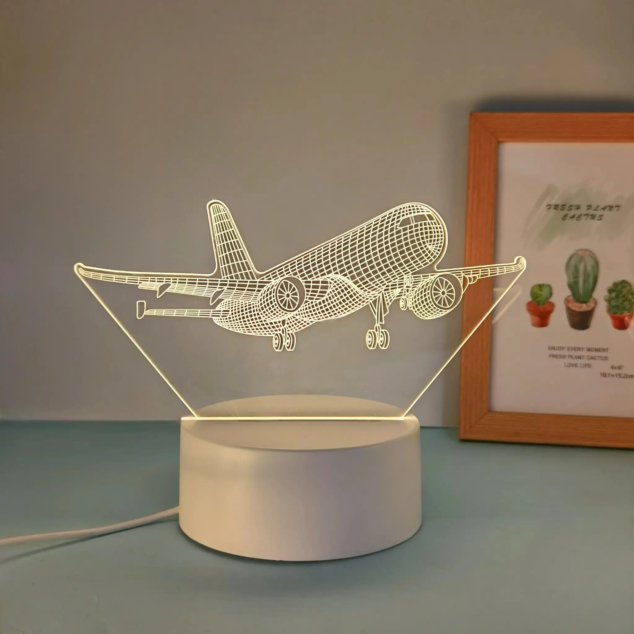 Simples Market 3D airplane night light with USB power; wireframe plane on a round pedestal