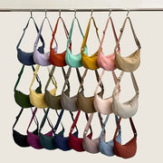 Nylon crossbody zipper bag by Simples Market; crescent-shaped dumpling style in assorted colors, large capacity