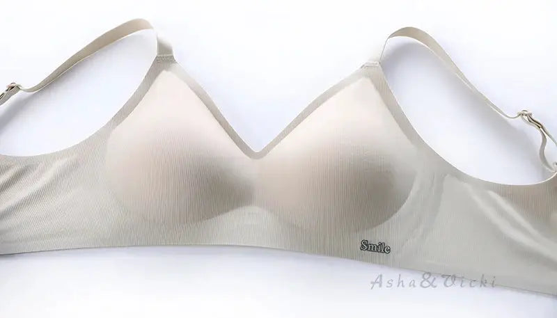 Simples Market nude latex cup bra with soft support straps, skin-tone color, Smile logo.