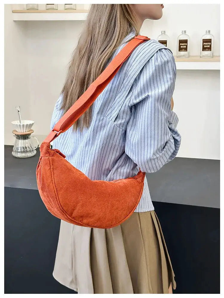 Corduroy women's hobo bag in orange with crossbody strap
