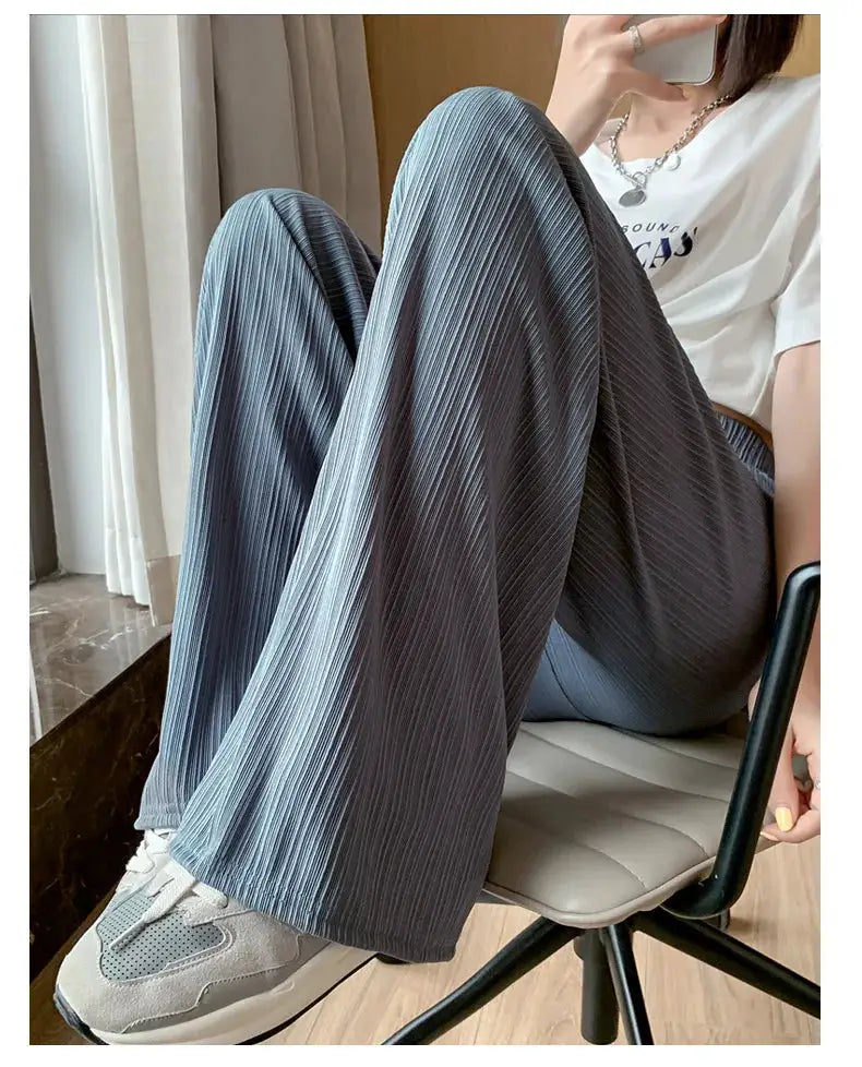 Thin summer wide-leg pants, blue-gray with fine vertical pleats and elastic waistband