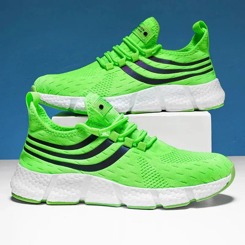 Pair of men's neon lime breathable lightweight running sneakers with black stripes and white sole