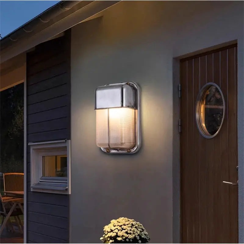 Outdoor retro LED wall lamp with ribbed glass shade and metal housing, IP65 waterproof