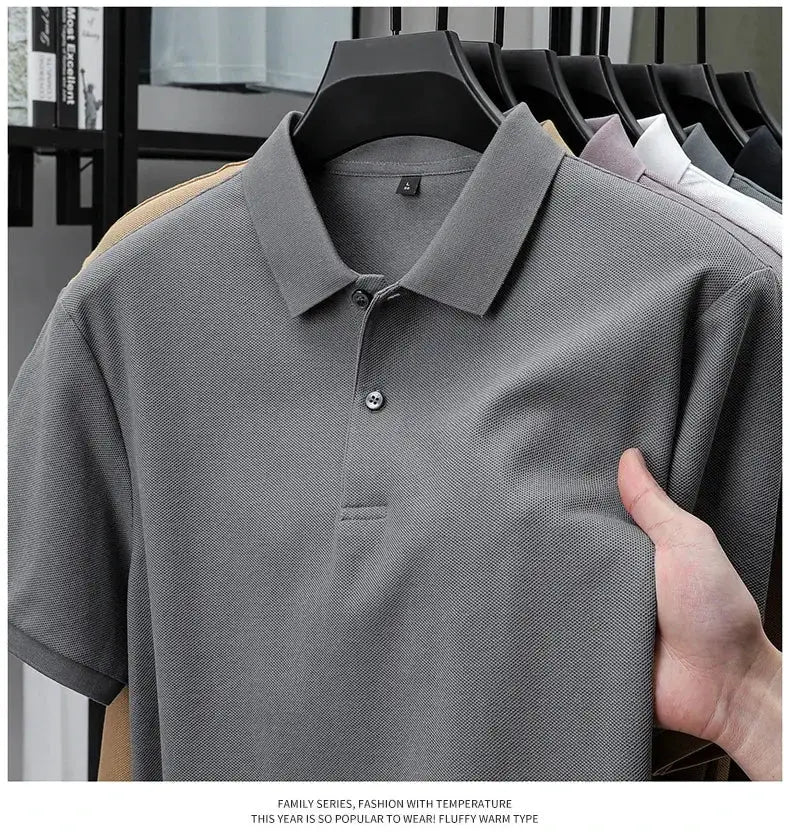 Men's grey 100% cotton polo shirt on hanger; breathable summer casual.