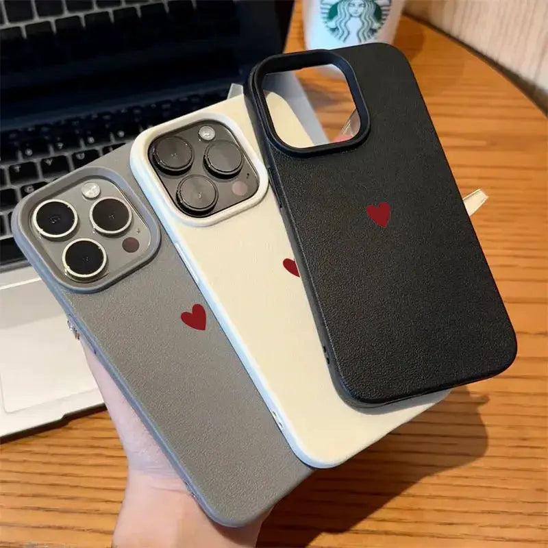 Phone cases set: three soft TPU iPhone cases with red love-heart motif in black, gray, white