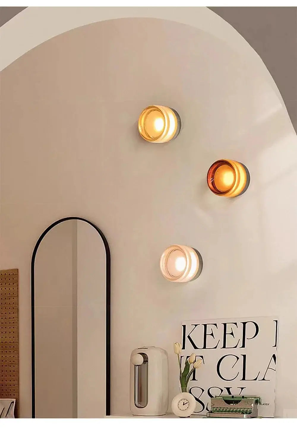 Modern LED wall lamp trio: amber jelly sconces on smokey grey wall