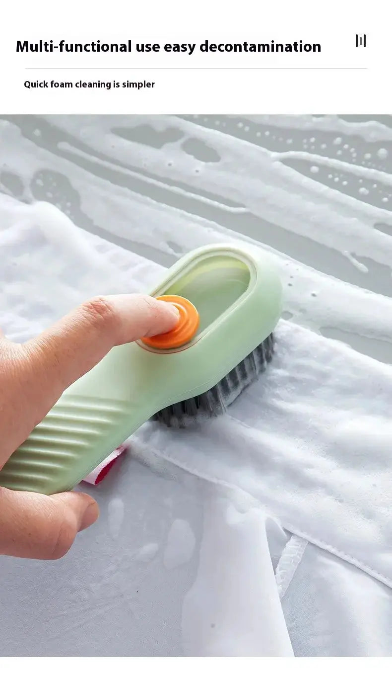 Shoes brush Simples Market, green cleaner with orange button and soft bristles for automatic liquid discharge