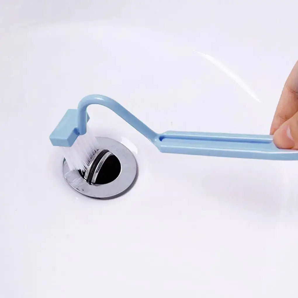 Toilet cleaning brush with S-shaped curved blue handle and white bristles