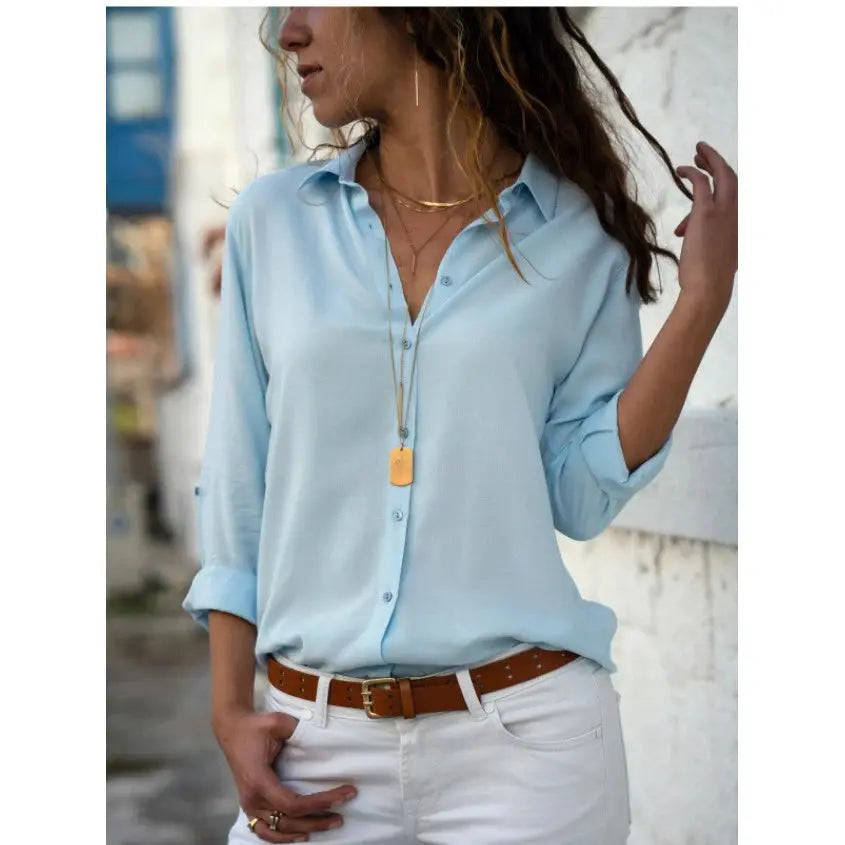 Autumn shirt blouse in light blue with polo collar, loose button-up with rolled sleeves