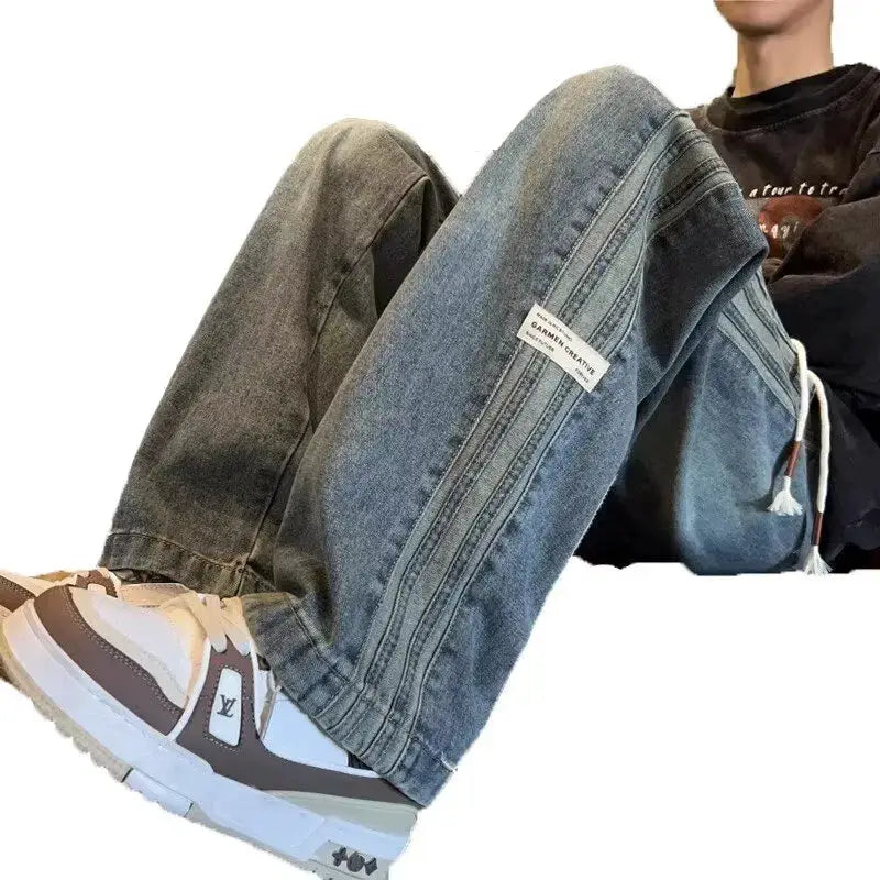 Simples Market men's blue denim jeans with elastic drawstring waist and loose straight leg.