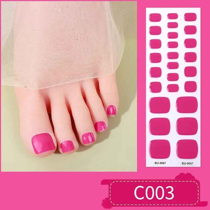 Gradient Auroras semi-cured gel nail strips in hot pink magenta on toenails with sticker sheet