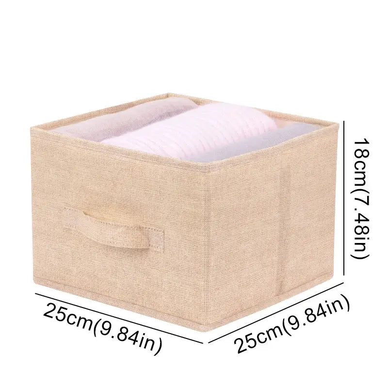 Beige cotton-linen hanging storage box by Simples Market; collapsible drawer-style wardrobe organizer, 25x25x18 cm