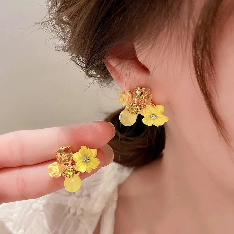 Earrings, colorful flower design with yellow petals and imitation pearl accents on gold-tone geometric studs (pair)