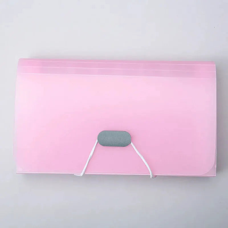 A6 pink expanding file folder with buckle closure by Simples Market.