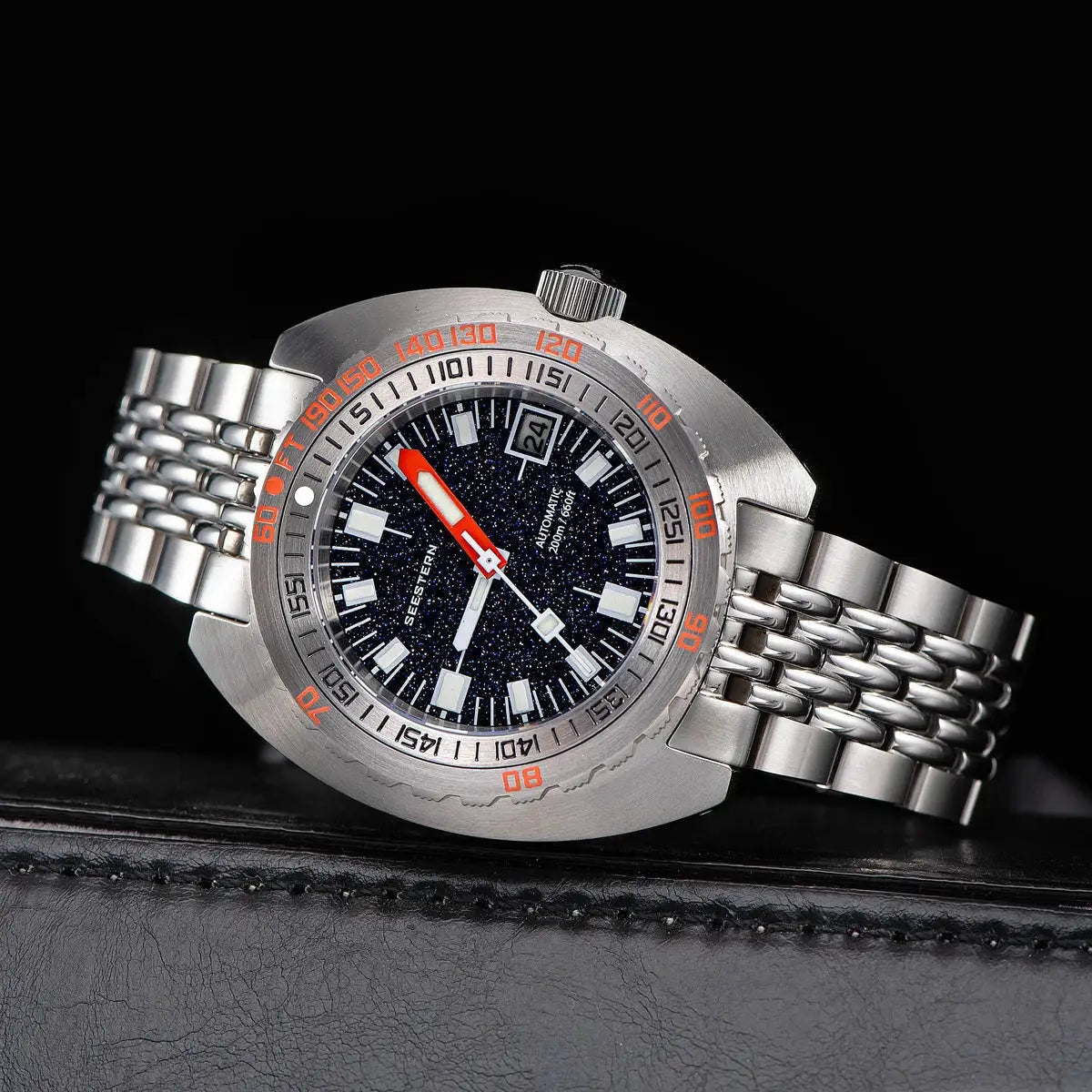 Seestern diver watch for men with stainless steel bracelet, blue speckled dial, orange bezel, date window, luminous hands