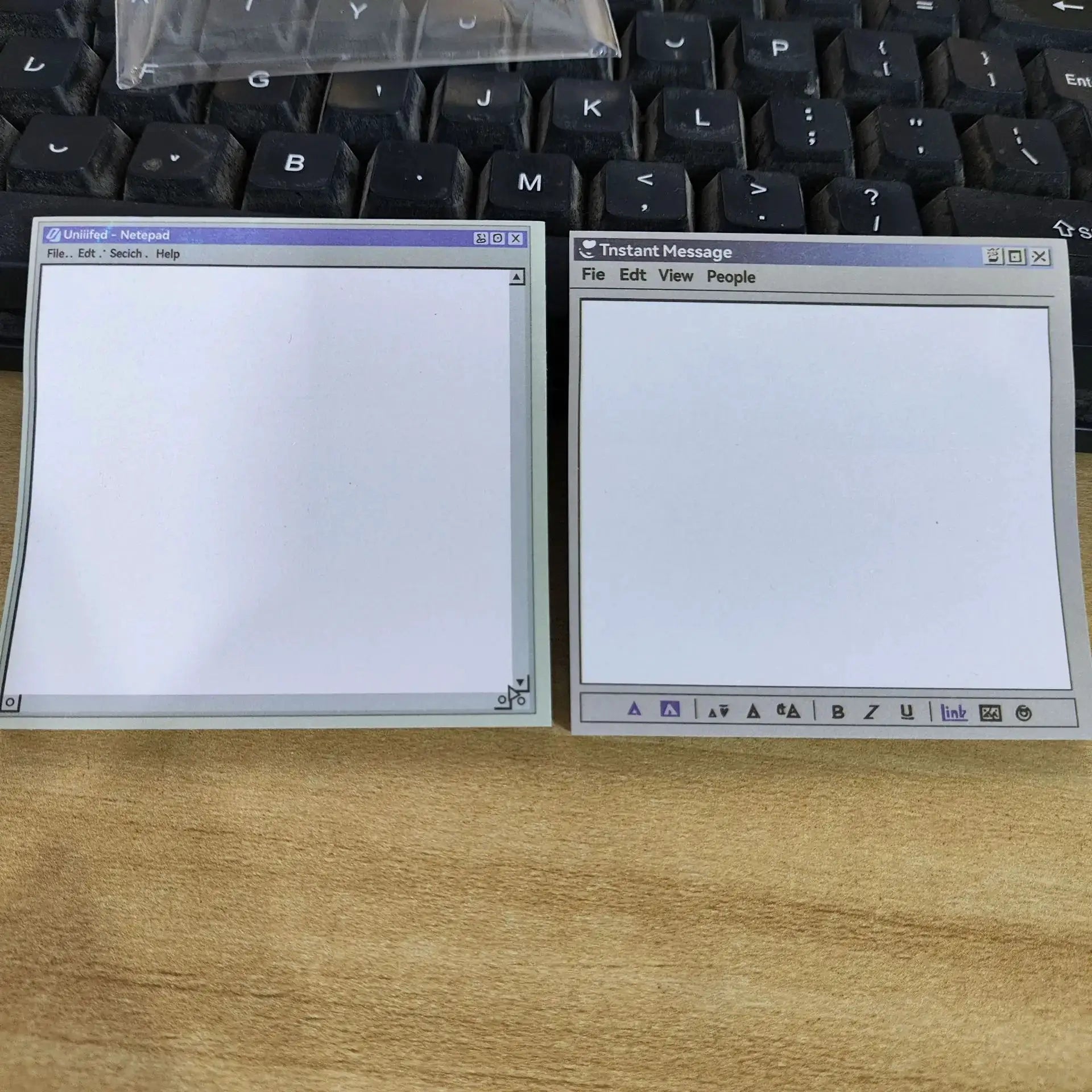 50-page retro computer drawing tools pattern notepad, minimalist blue-gray design, two on keyboard