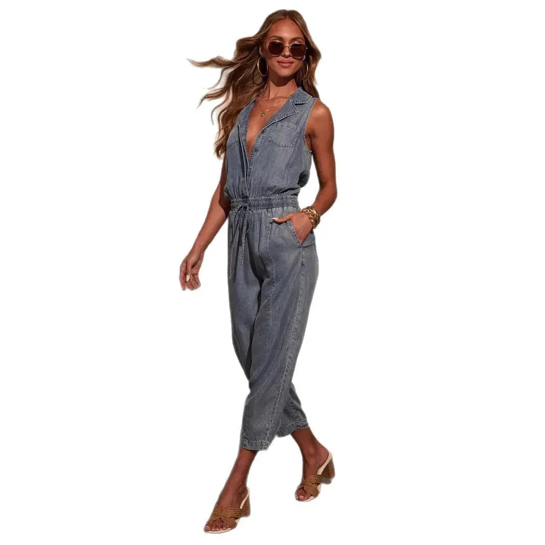 Women's sleeveless denim jumpsuit with drawstring waist, front pockets, casual overalls.